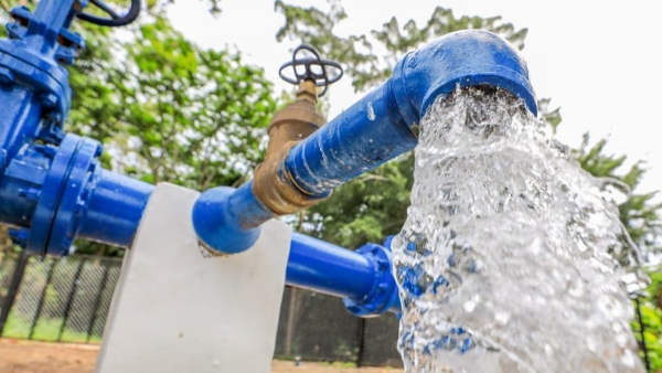 Firman convenio para que familias adquieran casa y agua potable